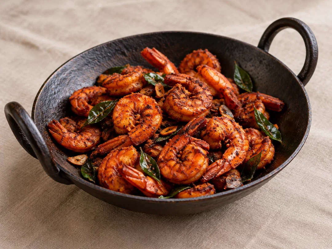 Coastal Prawn Fry — Dry coastal prawn fry with crisp red spice crust and curry leaves