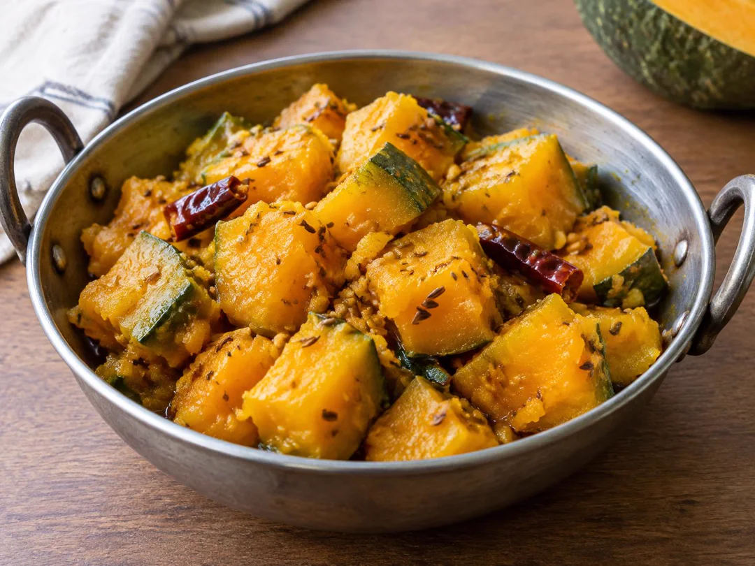 Khatta Meetha Kaddu — Soft lightly mashed sweet-sour pumpkin with cumin, fenugreek seeds and dried red chilli