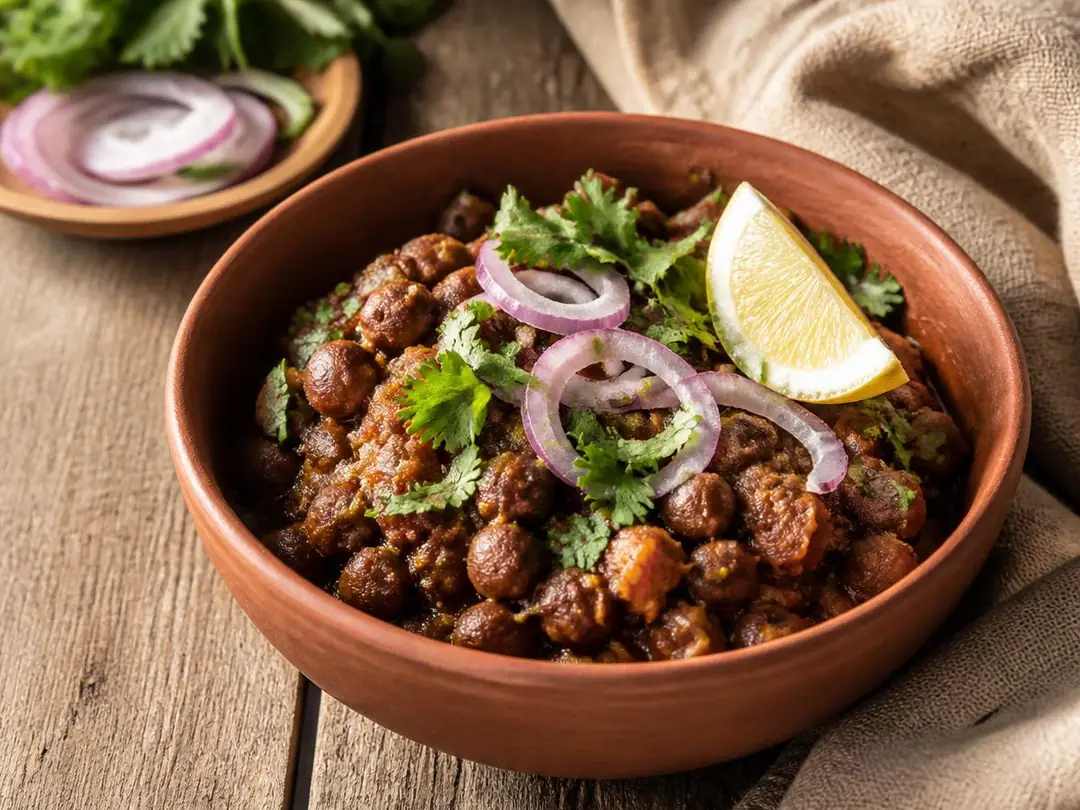 Kala Chana Masala — Kala chana masala with chickpeas, onion and coriander